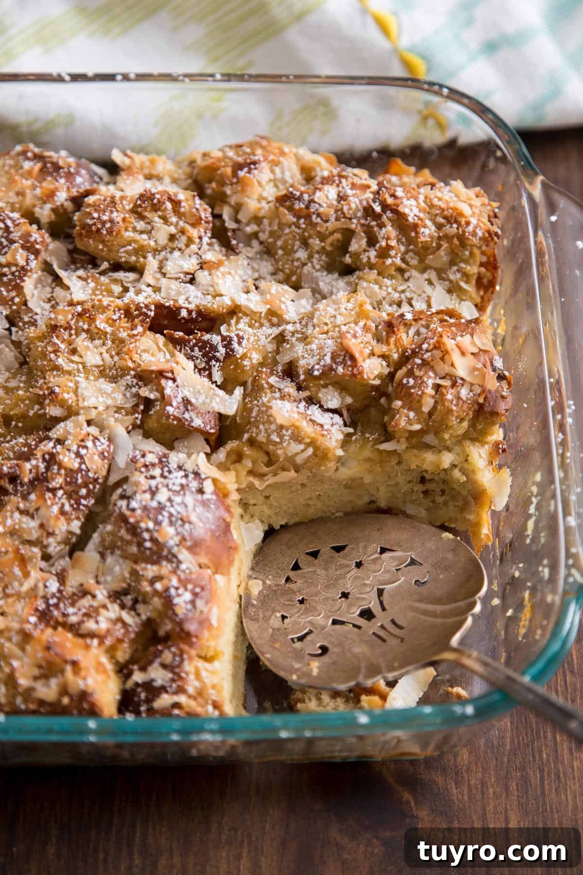 Coconut French toast casserole in a glass baking dish