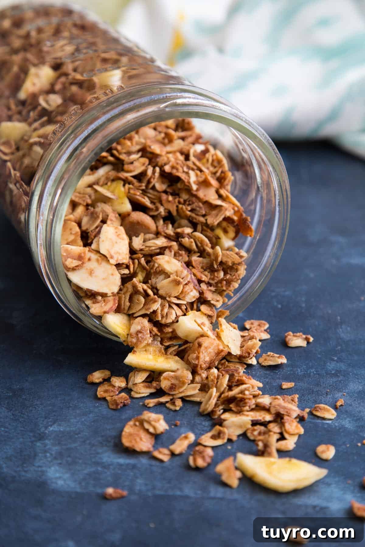 Surfer Granola spilling from a jar