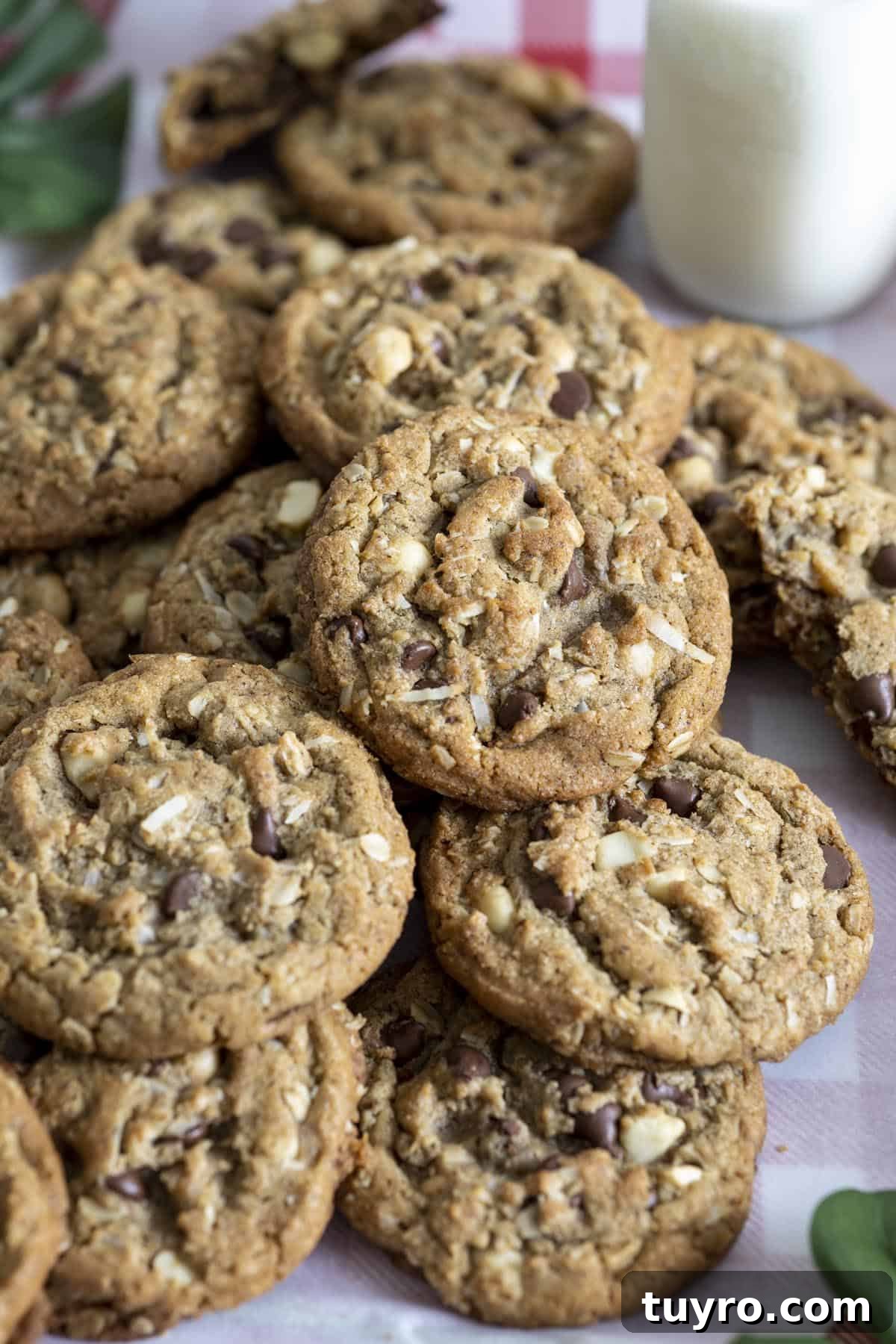 Big Island Cookies on a table with a glass of milk