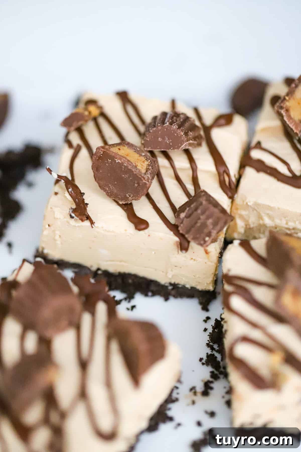Peanut Butter Cup Protein Cheesecake Recipe 3 Creamy filling being mixed in a bowl with an electric mixer