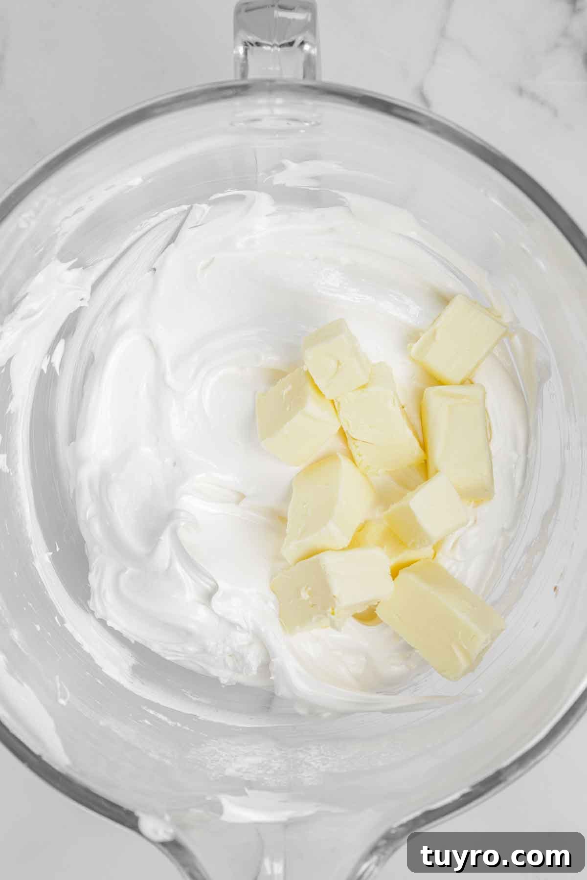 White Chocolate Swiss Meringue Buttercream Recipe 6 bowl with swiss meringue and butter