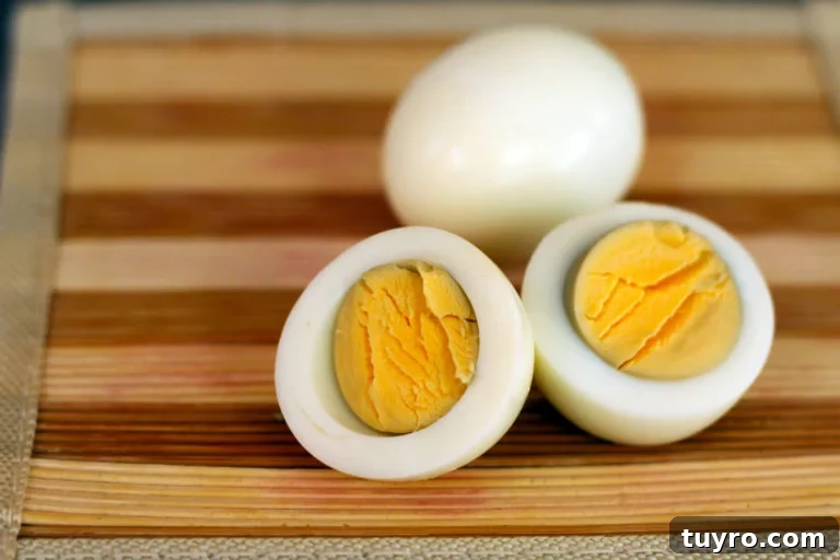 Hard boiled egg on a wood cutting board