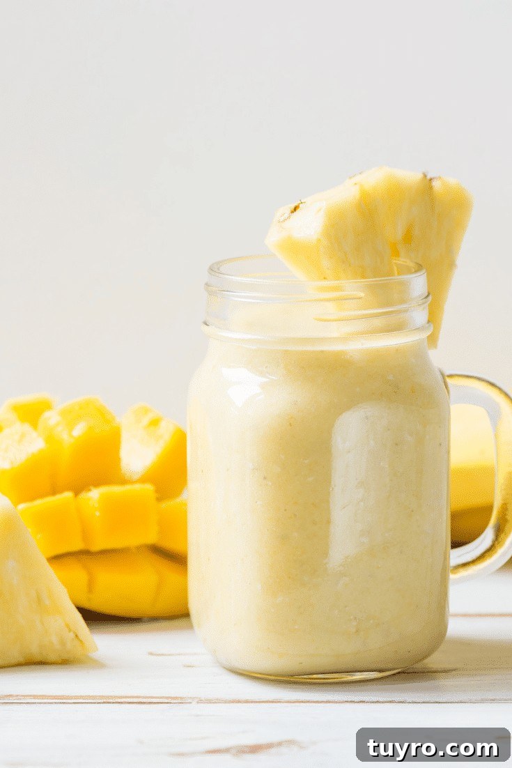 Tropical smoothie with pineapple and mango