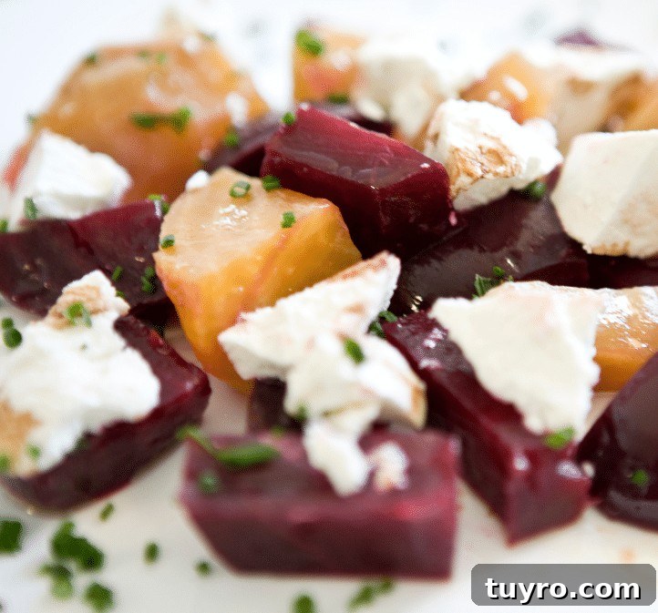 Red and golden beets topped with goat cheese