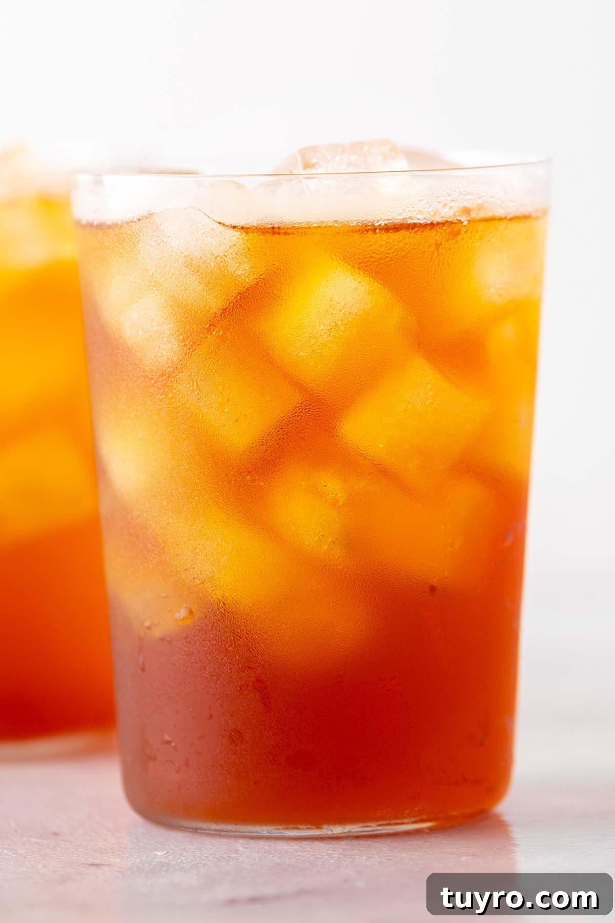 Starbucks Iced Black Tea: Flavor Guide & How to Order 2 Iced black tea in a glass.
