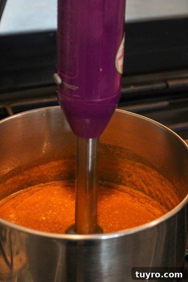 Creamy Gluten-Free Pumpkin Soup Recipe for Fall Comfort 5 pumpkin soup blending