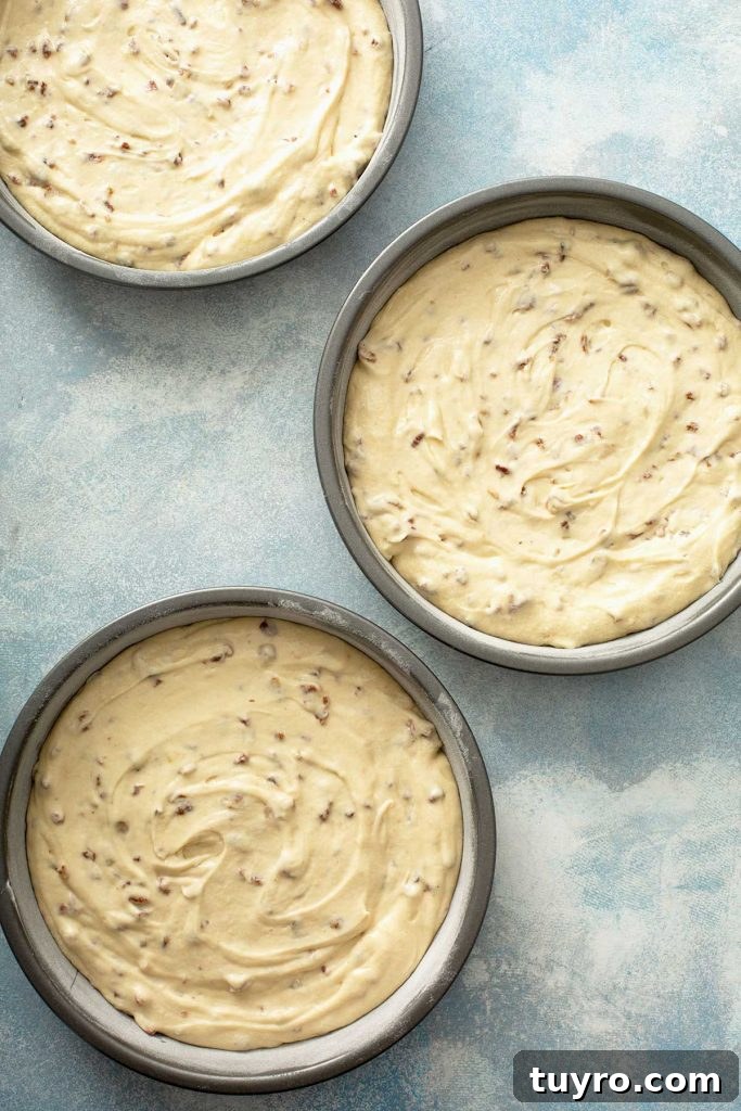 Butter Pecan Cake with Cream Cheese Frosting Recipe 13 butter pecan cake batter divided in 3 baking pans
