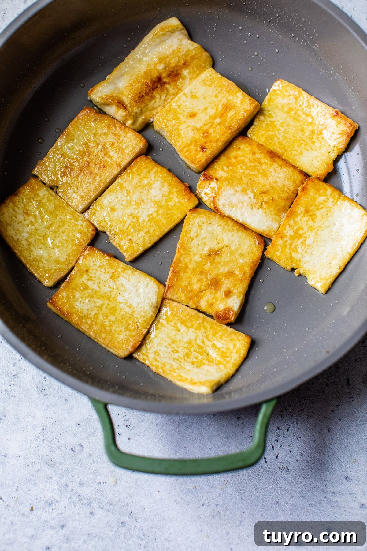 Tofu Banh Mi Sandwich with Pickled Vegetables 6 pan-fried tofu in a skillet