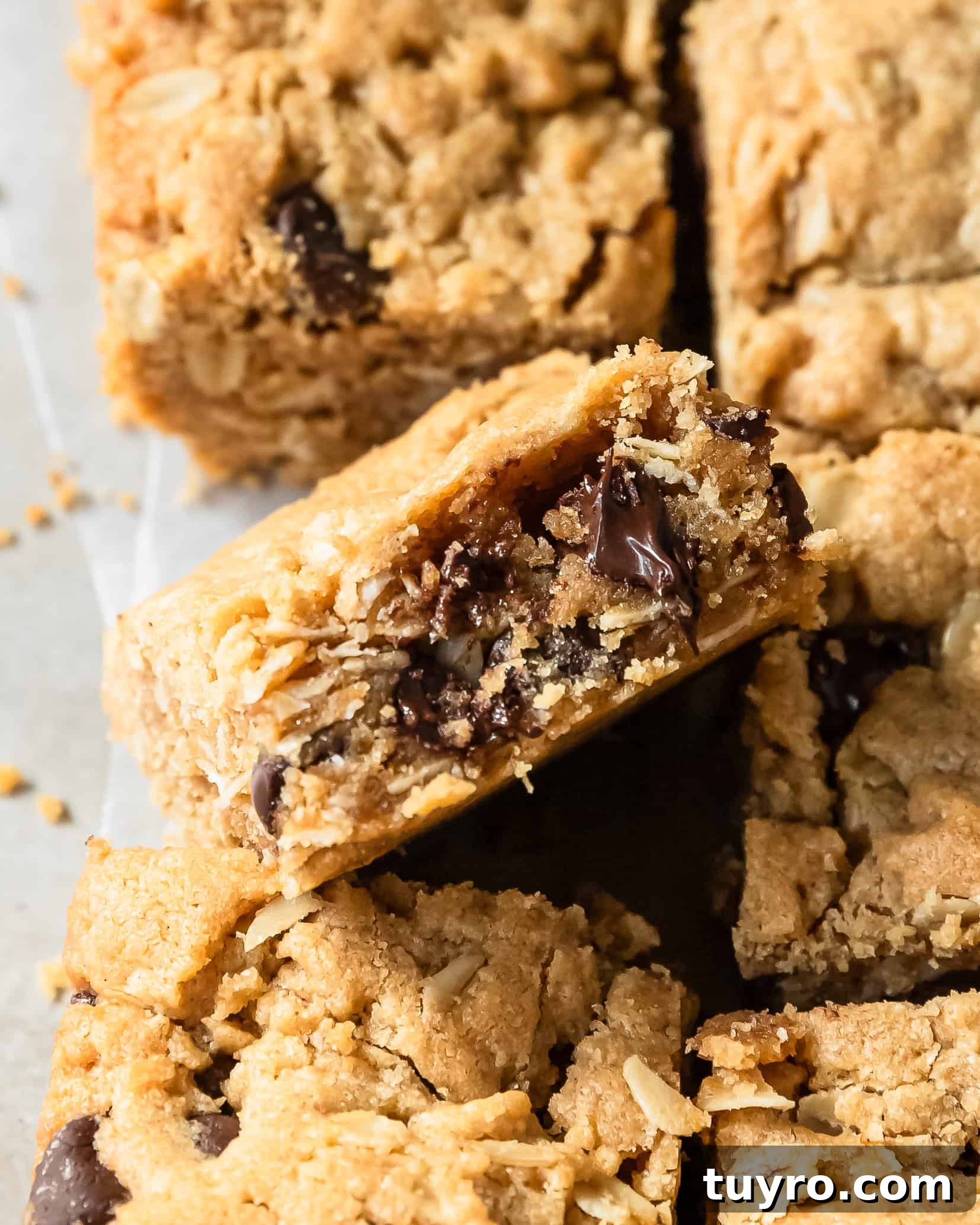 Chewy Peanut Butter Oatmeal Bars Recipe for Snack Time 4 Peanut butter oatmeal bars are soft and chewy, easy to make oatmeal bars filled with rich and creamy peanut butter, hearty oats and sweet chocolate chips.