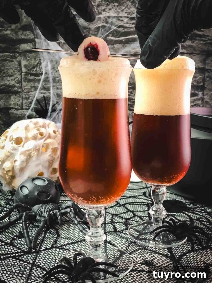 Garnish your black velvet cocktail with a spooky lychee eyeball!