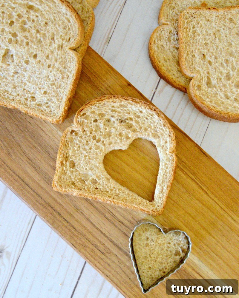 3-Ingredient Fairy Bread Recipe: Quick Party Treat 3 Cutting fairy bread with a cookie cutter