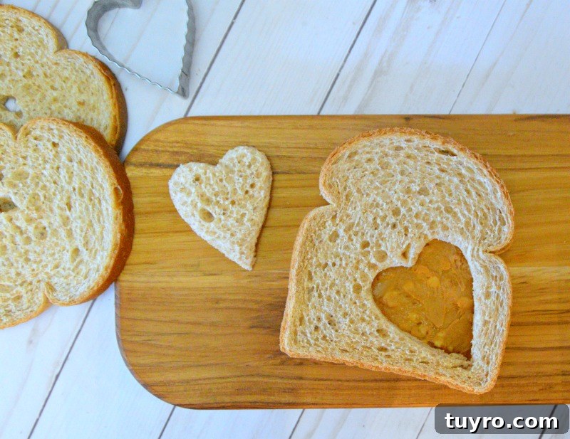 3-Ingredient Fairy Bread Recipe: Quick Party Treat 4 Spreading filling on bread