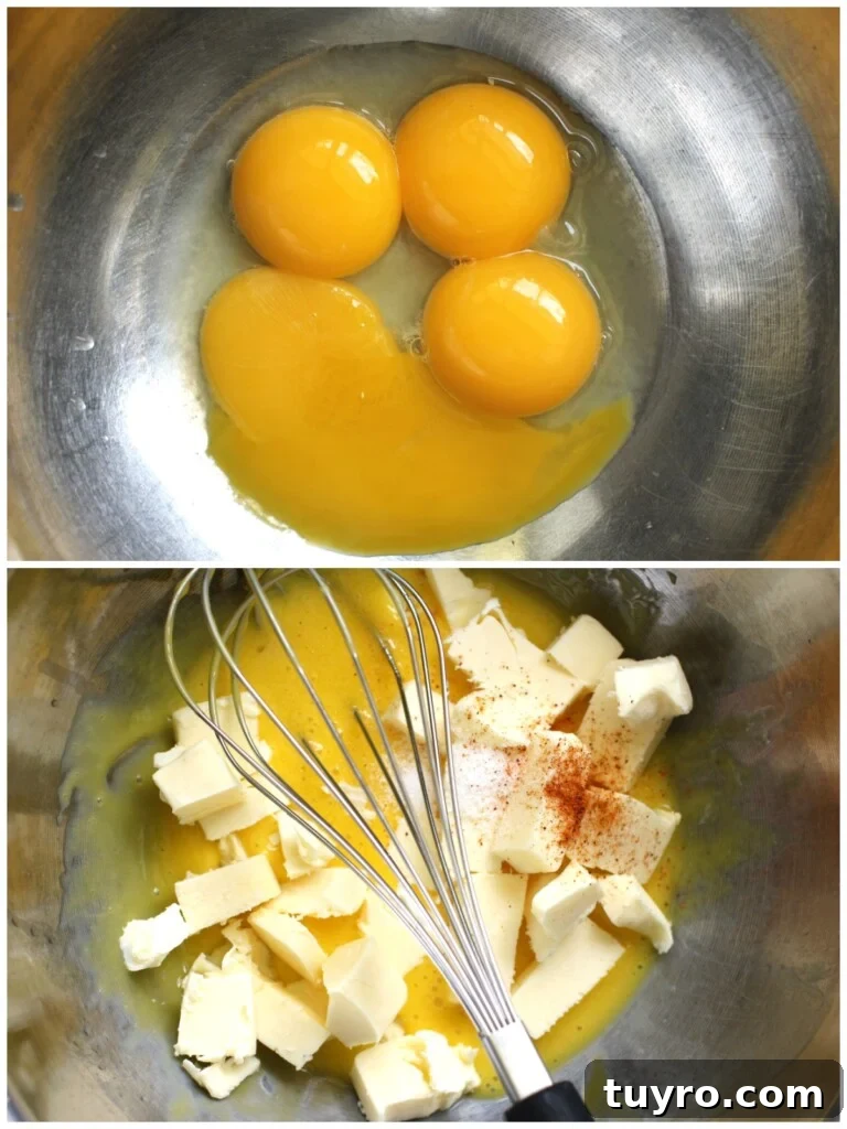 Classic Hollandaise Sauce Recipe for White Asparagus 7 Four yolks and lemon juice in a stainless steel bowl; cubed butter added and ready to whisk.