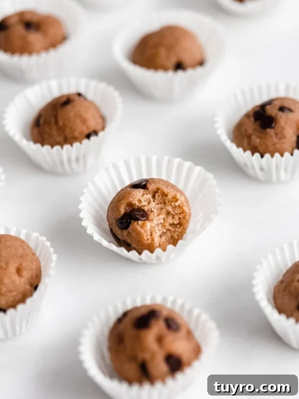High-Protein Banana Muffins for Quick Breakfast and Snacks 11 Chocolate chip cookie dough ball with a bite taken out of it
