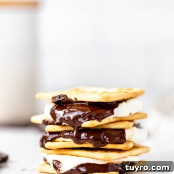 Air Fryer Smores Recipe 11 Stack of s'mores with melted chocolate.