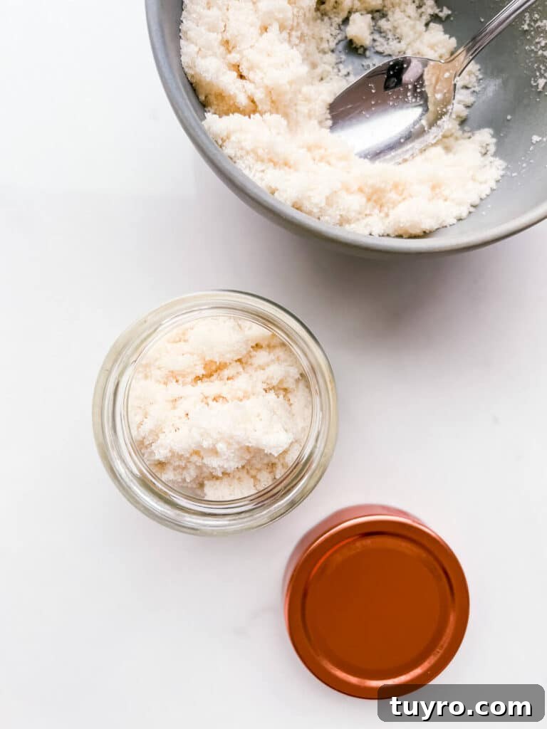 Make Vanilla Sugar at Home: Simple Recipe and Uses 12 Transferring homemade vanilla sugar to a jar to store it.