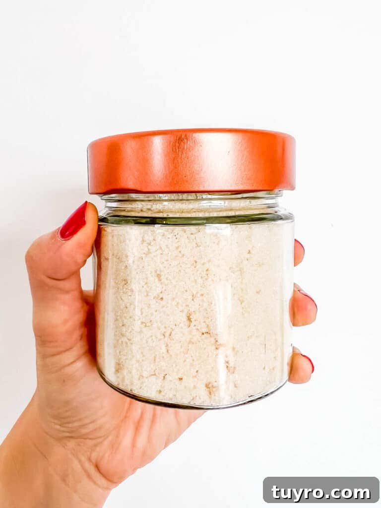 Make Vanilla Sugar at Home: Simple Recipe and Uses 13 A jar of vanilla sugar made from vanilla extract so it has a slightly golden colour.