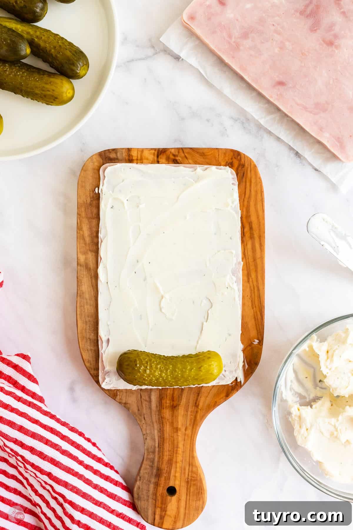 Crunchy Pickle Roll-Ups: Savory Snack Wrap Recipe 4 cream cheese on a slice of ham