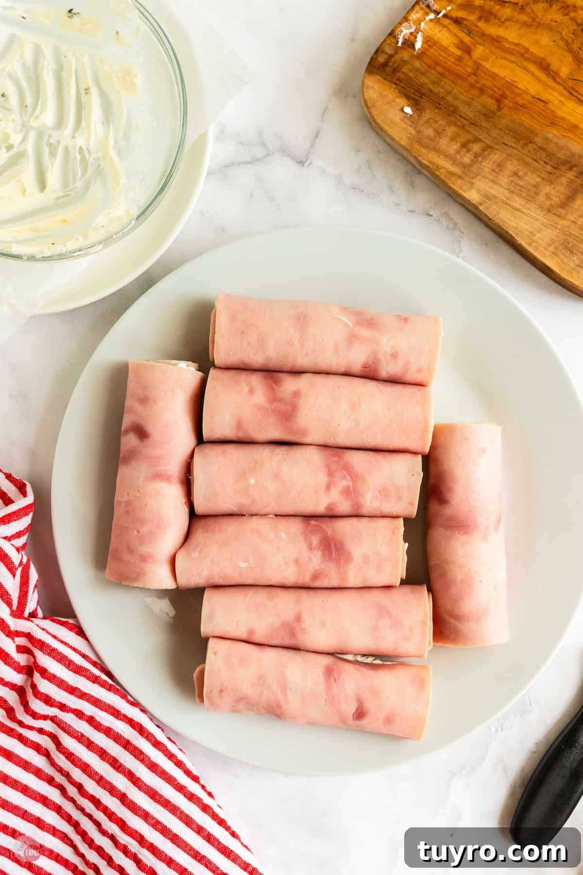 Crunchy Pickle Roll-Ups: Savory Snack Wrap Recipe 6 ham rolls on a plate