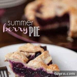 Fresh Summer Berry Pie Recipe 10 a slice of summer berry pie on a plate