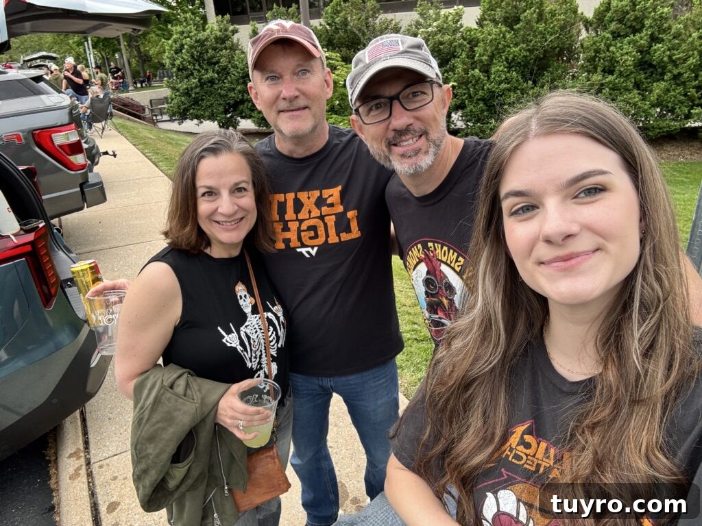 30+ Activities to Connect with Your Young Adult Children 11 Family enjoying a Metallica concert tailgate, smiling together in band shirts before the live show experience.