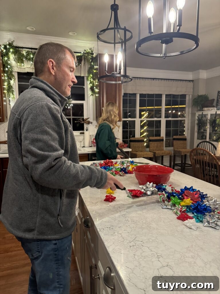 30+ Activities to Connect with Your Young Adult Children 4 Father and daughter playing a Christmas party game with colorful bows spread across the counter during holiday family fun.