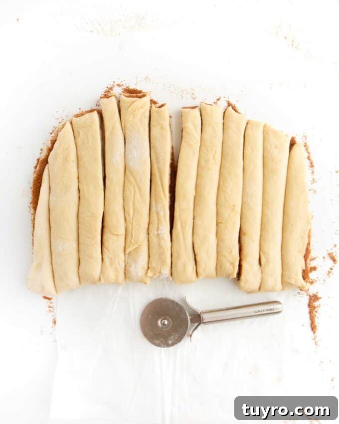 cinnamon roll dough cut into strips