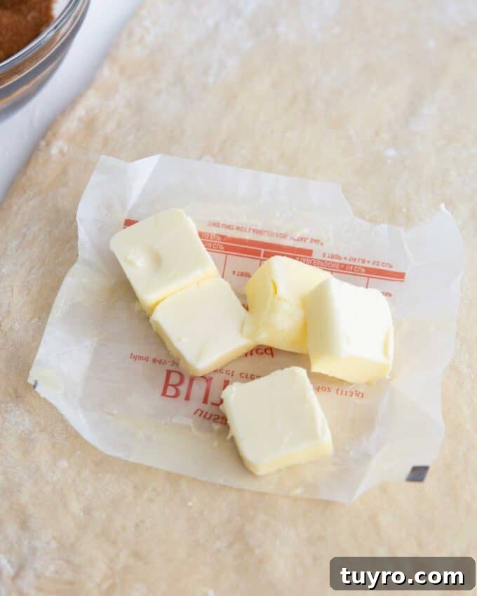 softened butter squares on wrapper