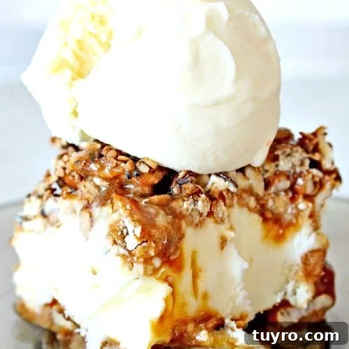 Cloe up image of ice cream sandwich made with caramel and pretzels and topped with vanilla ice cream