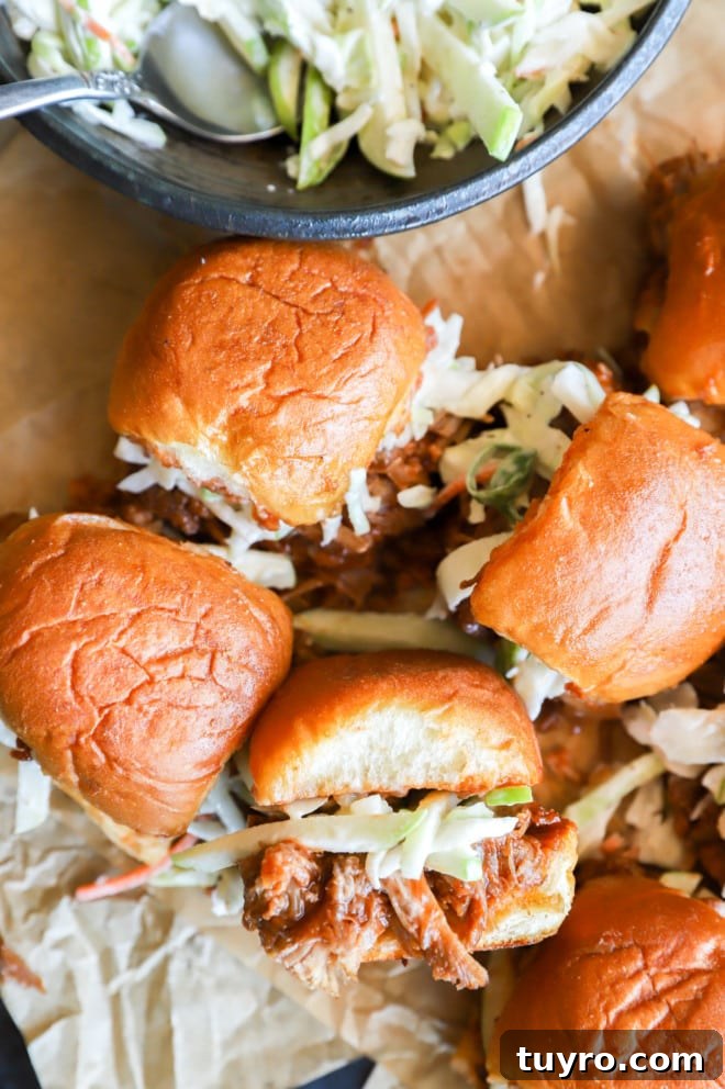 BBQ Pulled Pork Sliders with Crisp Apple Coleslaw 2 Overhead image of pulled pork sliders and apple coleslaw