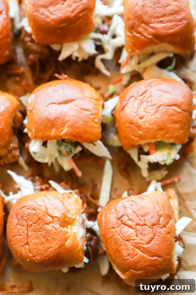 BBQ Pulled Pork Sliders with Crisp Apple Coleslaw 10 Image of sandwiches with apple coleslaw