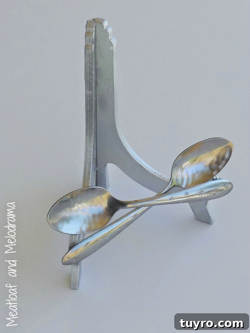 anthropologie inspired retro crossed spoon plate stand silver spray painted plate stand with vintage crossed spoons