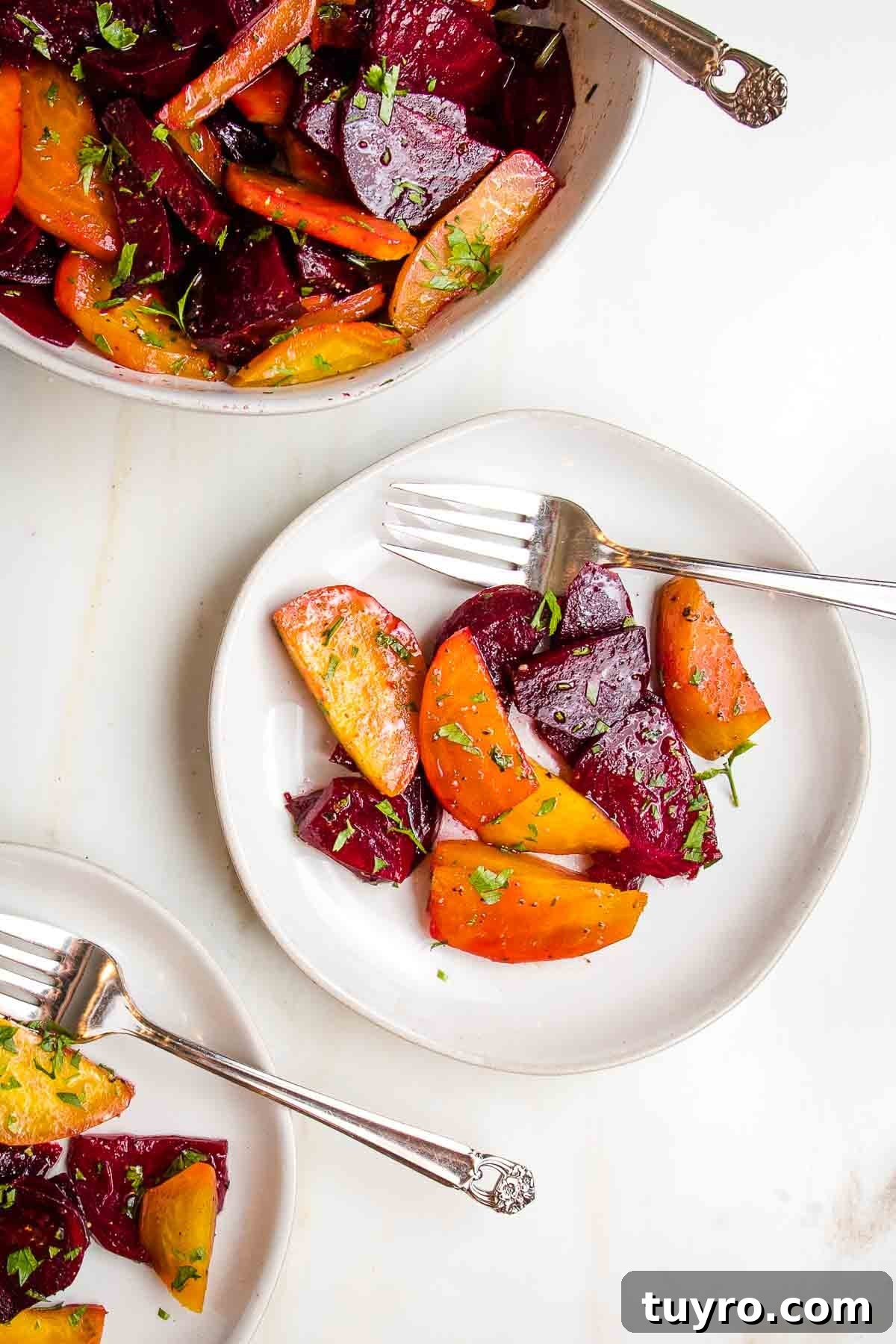 Roasted Beet Salad with Balsamic Vinaigrette and Goat Cheese 2 White bowl filled with golden and red beets, cut into wedges, with a vinaigrette and chopped fresh parsley. Roasted beet salad with balsamic vinaigrette.