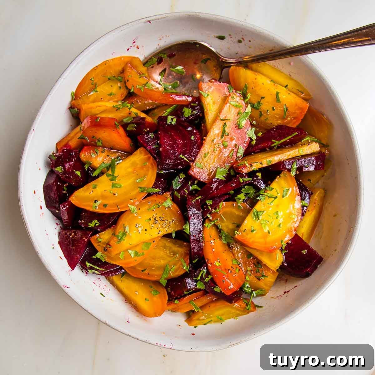 Roasted Beet Salad with Balsamic Vinaigrette and Goat Cheese 14 Whole roasted beet salad. Golden and red beets cut into wedges, drizzled with oil and vinegar and sprinkled with fresh parsley.