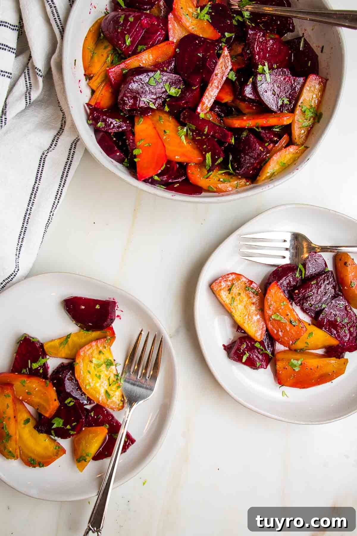 Roasted Beet Salad with Balsamic Vinaigrette and Goat Cheese 15 Roasted beet salad sprinkled with chopped parsley in a white bowl.