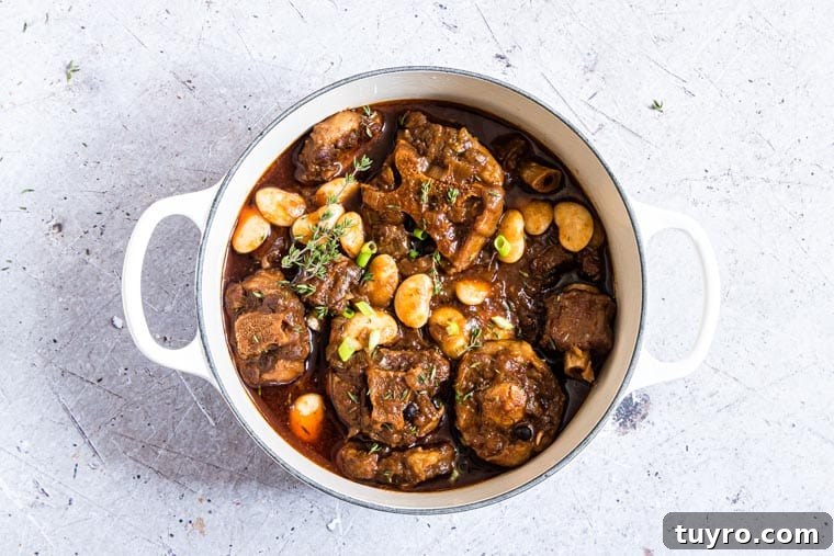 Gluten-Free Jamaican Oxtail Stew Recipe for Rich, Authentic Flavor 6 Jamaican Oxtail recipe in a white ceramic dish