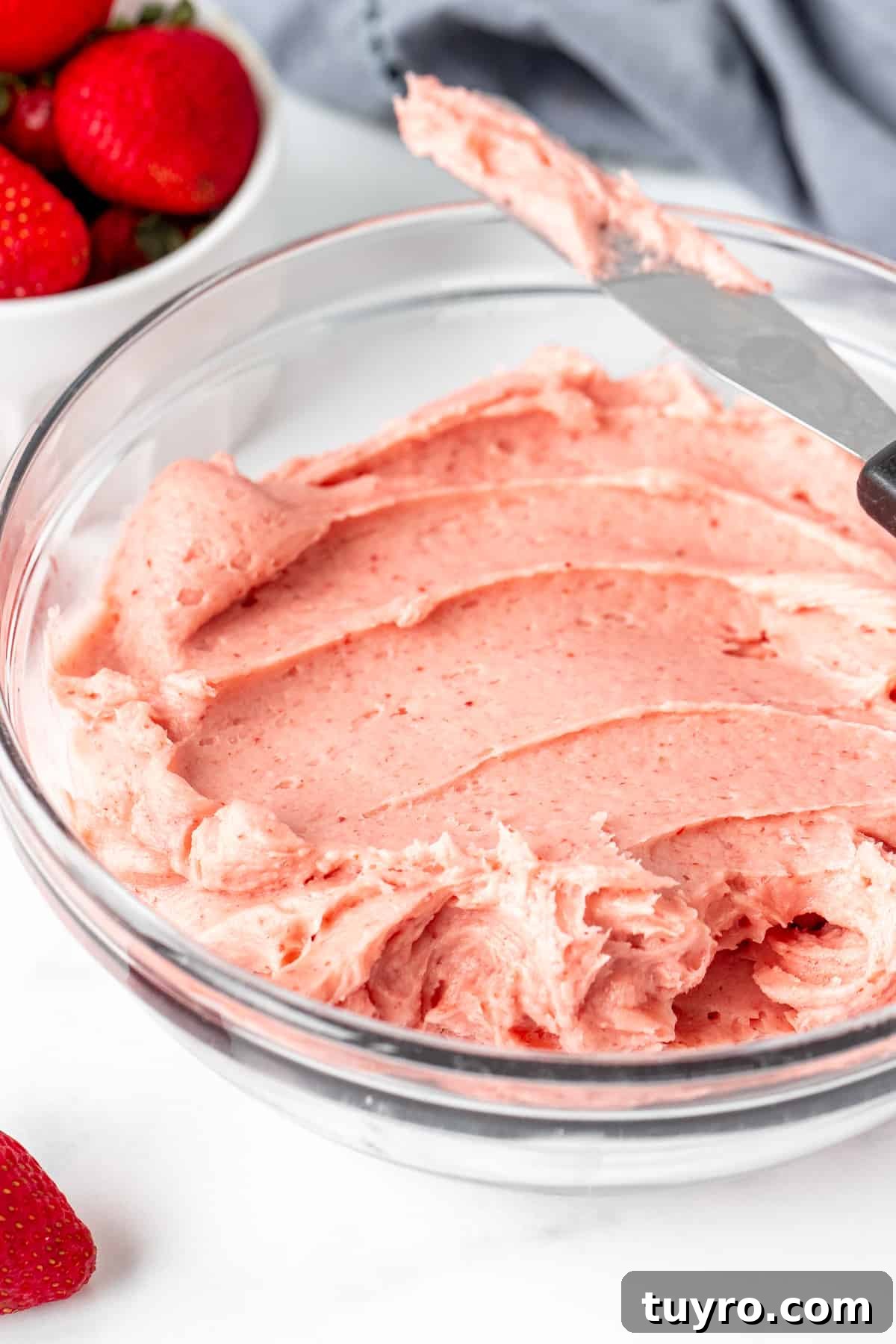 Strawberry Buttercream Frosting Made with Fresh or Frozen Berries 3 Bowl of creamy strawberry frosting