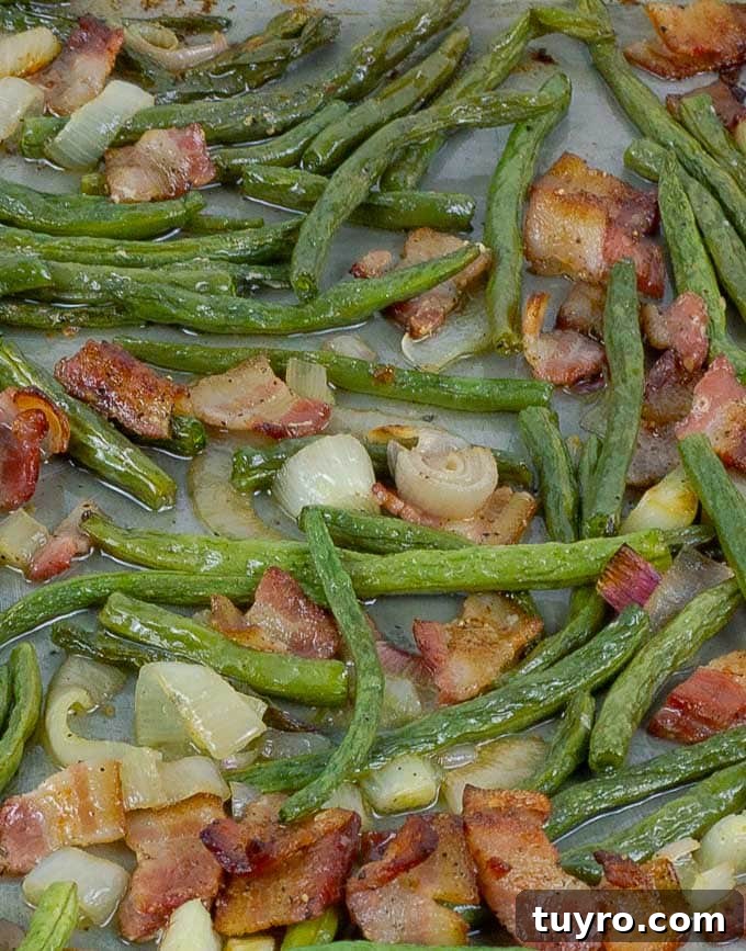 Crisp Roasted Green Beans with Bacon and Caramelized Shallots 3 Fresh Roasted Green Beans with Bacon and Shallots on metal baking sheet