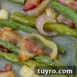 Crisp Roasted Green Beans with Bacon and Caramelized Shallots 6 Fresh Roasted Green Beans with Bacon and Shallots on metal baking sheet