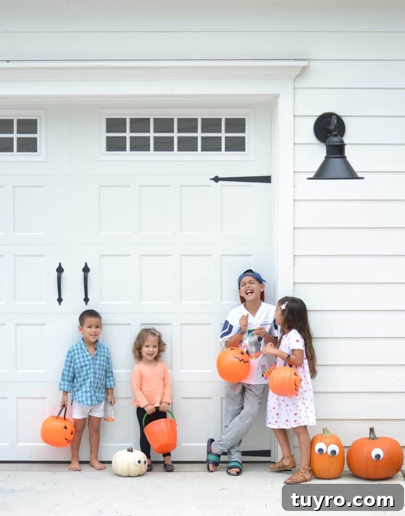 Affordable Fall and Halloween Home Tour: Stylish Seasonal Decor on a Budget 4 kids outside with eyes on pumpkins- another idea on how to decorate without spending a lot of money