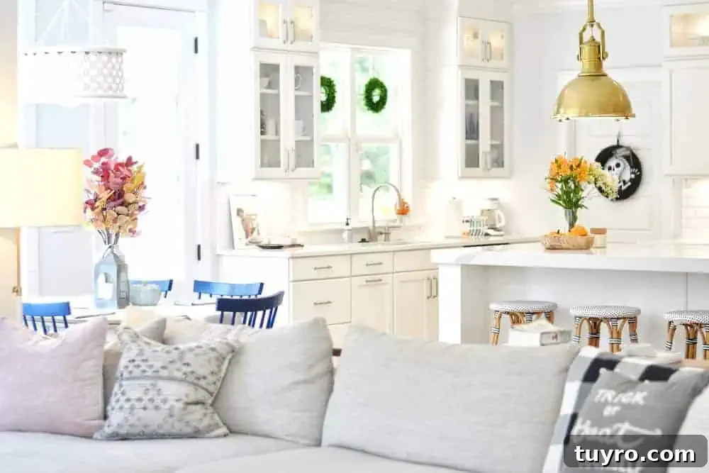 Affordable Fall and Halloween Home Tour: Stylish Seasonal Decor on a Budget 8 our sofa and kitchen with cheap decorations for halloween