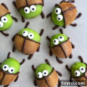 Beetlejuice Kiwis are decorated with chocolate and candy eyes to resemble cartoon beetles.