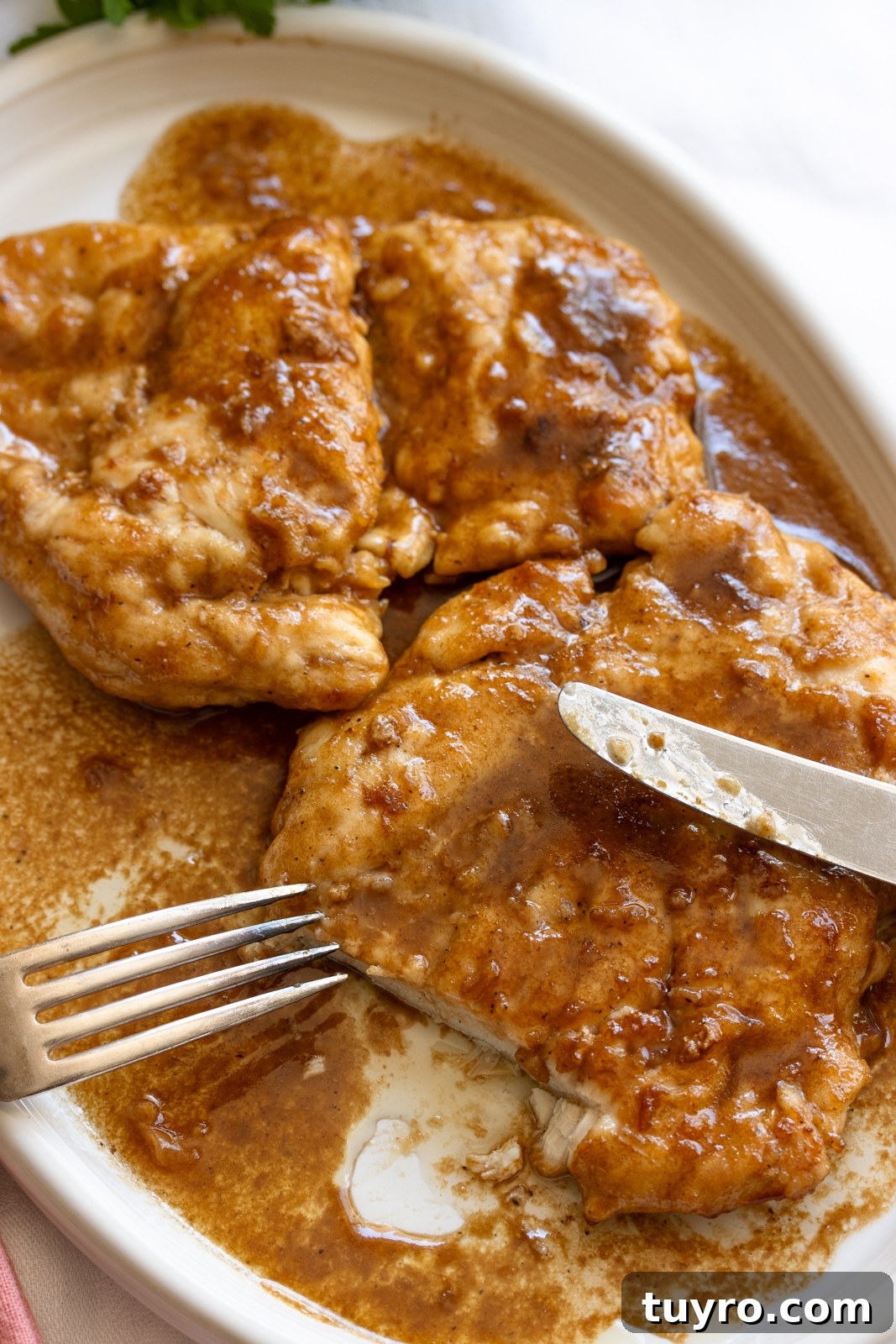 Classic Chicken Marsala Recipe with Mushroom Wine Sauce 10 chicken marsala on a white serving plate