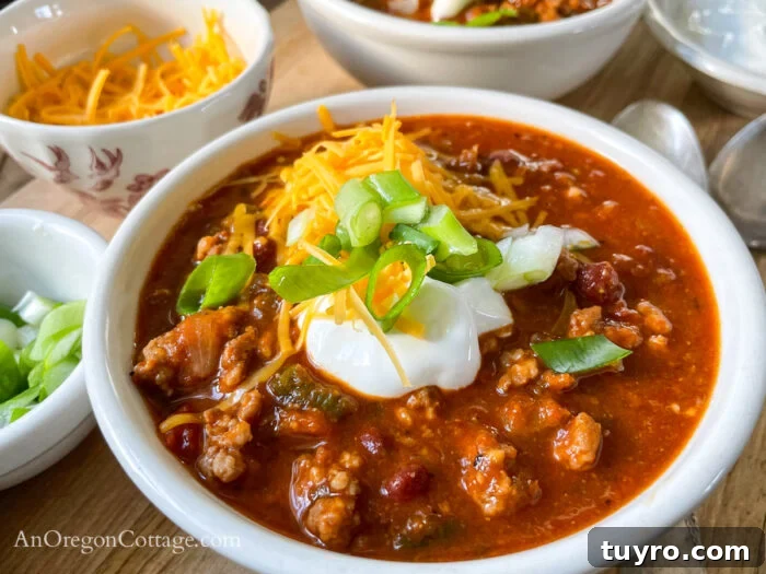 How to Make Chili: Stovetop, Crockpot, and Instant Pot 7 chili in bowl with toppings