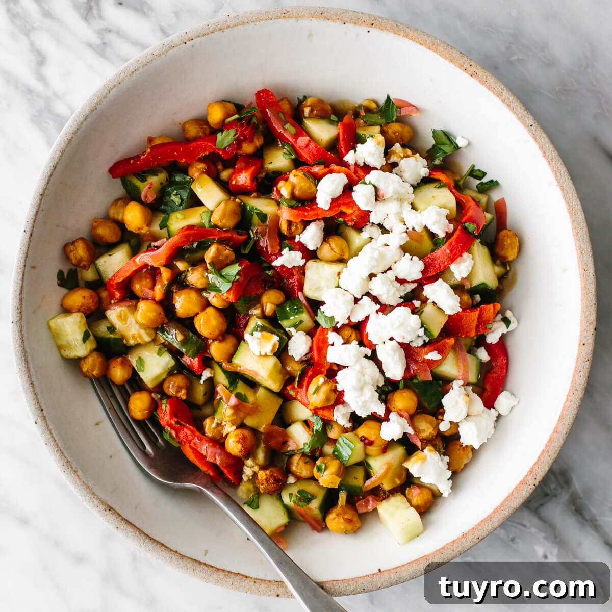 Roasted red pepper chickpea salad Chickpea salad in a bowl for budget meal prep