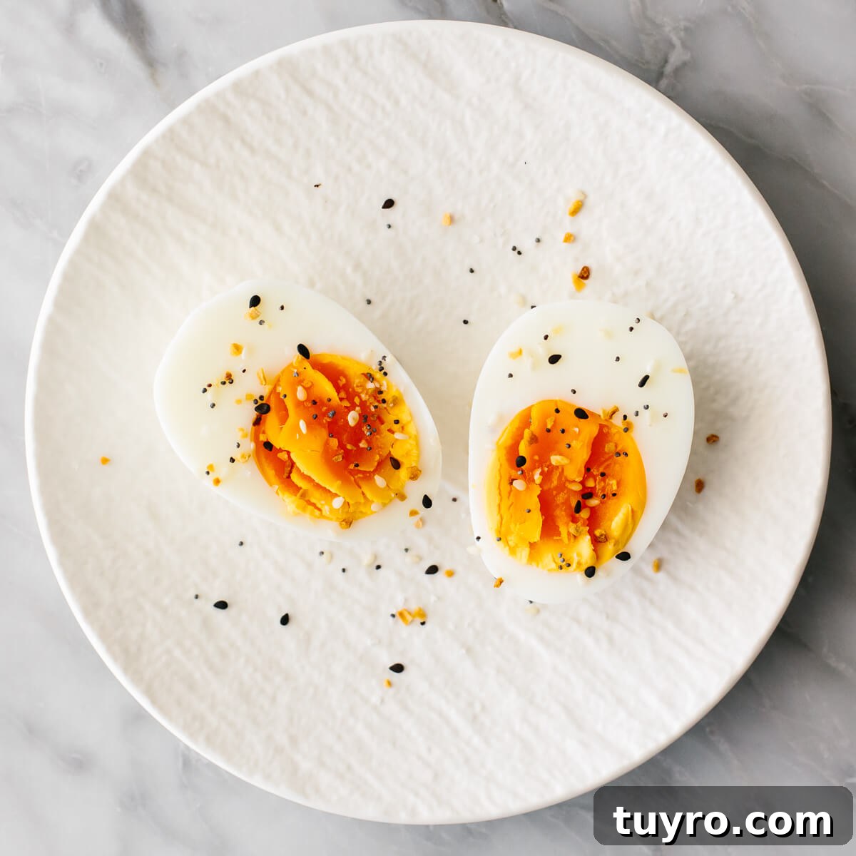 Budget-friendly boiled egg snack Boiled egg with seasoning on a plate