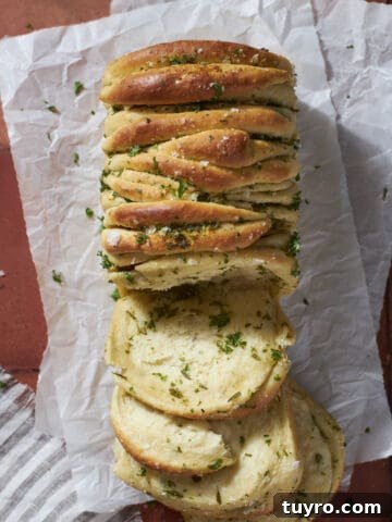 Sourdough Discard Pull Apart Bread with a few layers pulled out.