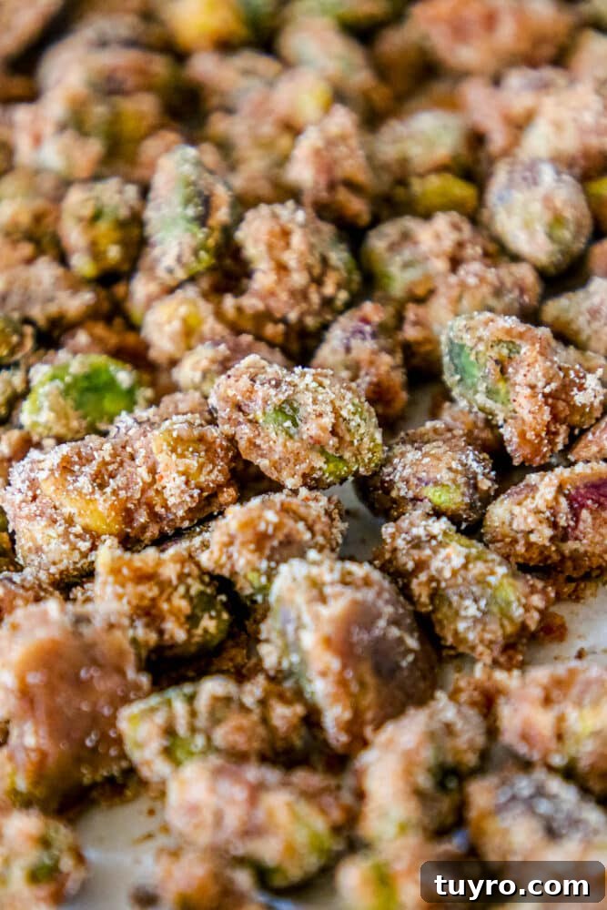 Sweet Candied Pistachios Recipe for Snacks & Gifts 9 picture of candied nuts on a baking sheet