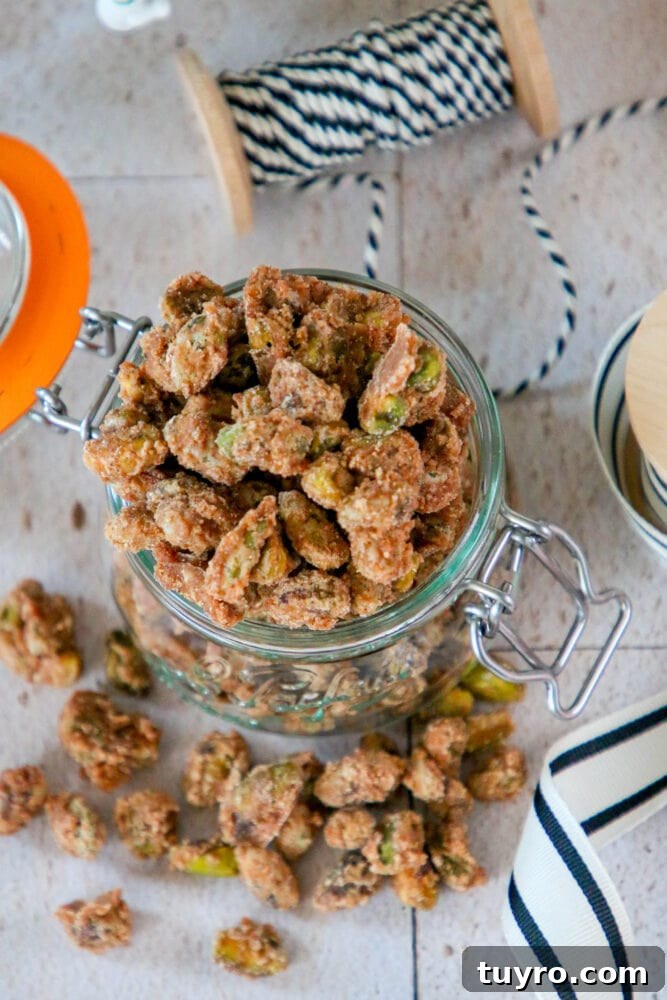 Sweet Candied Pistachios Recipe for Snacks & Gifts 10 picture of candied pistachios in a glass jar