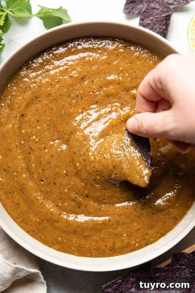 Smoky Roasted Tomatillo Salsa Verde Recipe 5 roasted tomatillo salsa in a bowl.